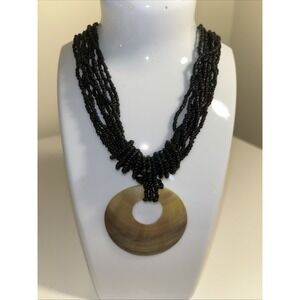 Necklace Black Glass Seed Bead Nine Strand Shell Donut Pendant Boho Tribal